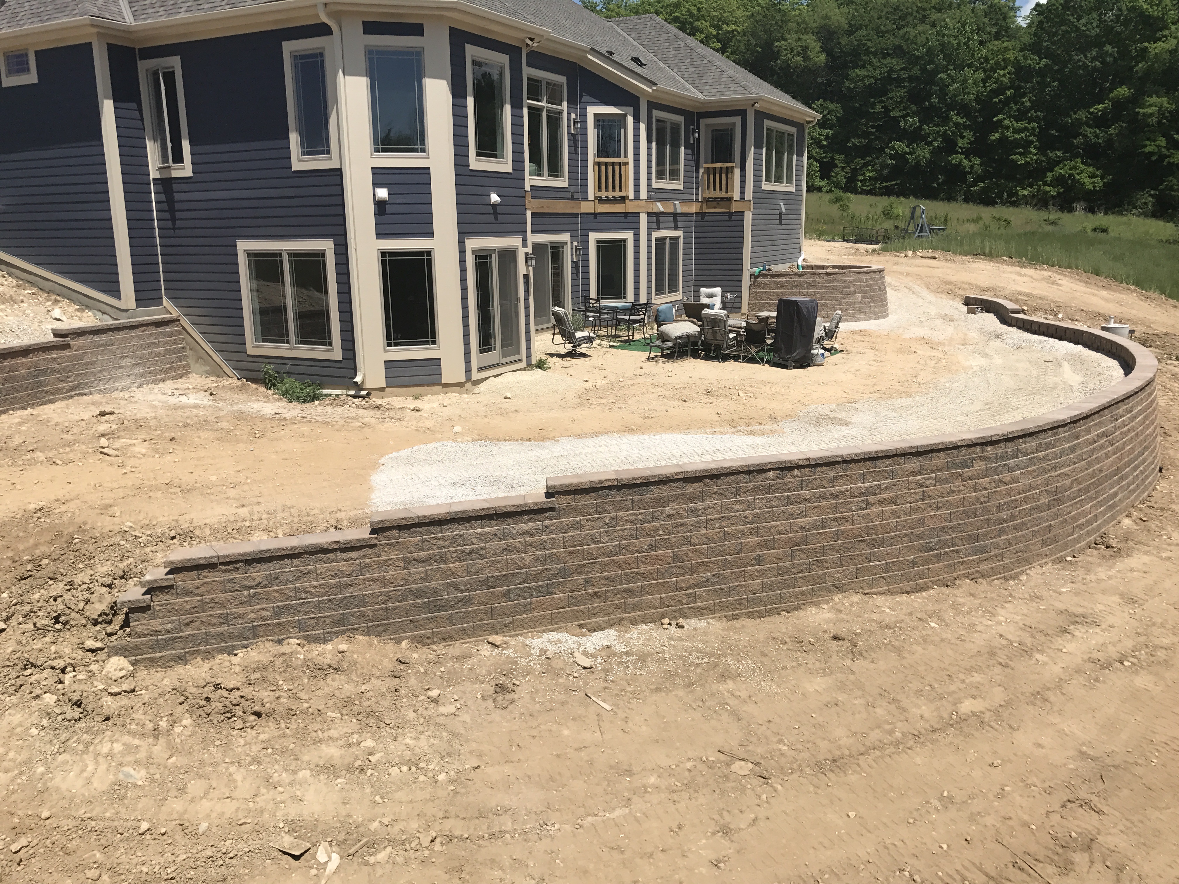 Completed retaining wall project at a residential property in southeastern Wisconsin